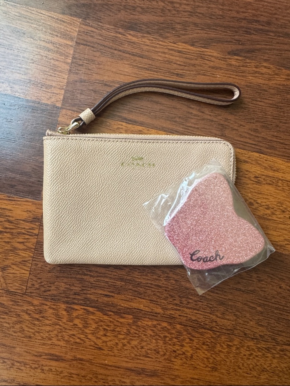 Coach Pale Pink Pebbled Leather Wristlet with Coach compact mirror